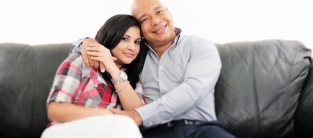 Couples' Therapy. Couple on black sofa